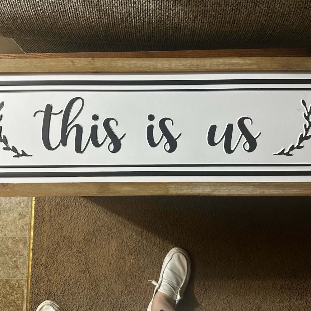 "This is us" wall sign